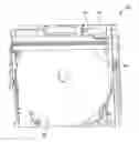 Fig. 01 - Disk drive having disk-positioning members to facilitate rotation of an optical disk at the reading and/or writing position