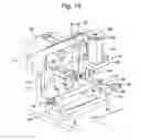 Fig. 12 - Lens blank alignment and blocking device and method