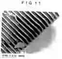 Fig. 12 - Method of forming fine partition walls, method of producing planar display device, and abrasive for jet processing