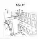 Fig. 12 - Sterilizer cassette handling system with dual visual code reading