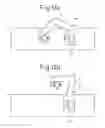 Fig. 12 - Molded component retrieving apparatus and a molding machine having the molded component retrieving apparatus mounted thereon