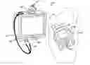 Fig. 01 - Portable hand-held entertainment system with connectivity to non-integrated displays