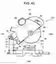 Fig. 21 - Cutter with laser generator that irradiates cutting position on workpiece to facilitate alignment of blade with cutting position
