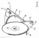Fig. 03 - Package having pivoted tray for retaining disc-shaped element