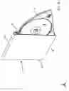 Fig. 09 - Package having pivoted tray for retaining disc-shaped element