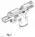 Fig. 04 - Handgun with two-sided breechblock mechanism