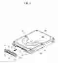 Fig. 06 - Hard disk drive with supplemental mechanical coupling mechanism