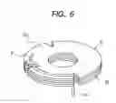 Fig. 06 - Electromagnetic switch with fixed magnetic core having disc portion formed of stack of base and balance metal sheets