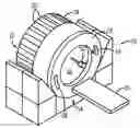 Fig. 01 - CT gantry mounted radioactive source loader for PET calibration