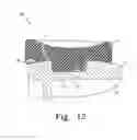 Fig. 13 - Mobile bearing assembly having a non-planar interface