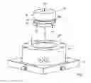 Fig. 02 - Clamping fixture including a chuck and a workpiece pallet releasably located thereon