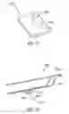 Fig. 10 - Restraint system for a hood lift device