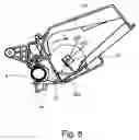 Fig. 09 - Developing device having stirring portion with a sweeping edge to carry developer