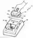 Fig. 01 - Docking charger for charging a hand held electronic device with or without a protective cover case fitted thereon