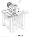 Fig. 31 - Device for finish-machining of optically effective surfaces of workpieces, in particular spectacle lenses