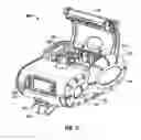 Fig. 11 - Portable printer with asymmetrically-damped media centering