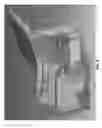 Fig. 12 - Modular connector assembly configured with both optical and electrical connections for providing both optical and electrical communications capabilities, and a system that incorporates the assembly