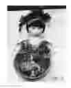 Fig. 20 - Combined toy doll and artificial flower