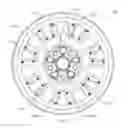 Fig. 11 - Vehicle wheel with decorative attachments