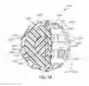 Fig. 26 - Golf ball with cover layer having zones of differing materials