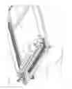 Fig. 26 - Installation for the layered construction of a shaped body, comprising a coating device cleaner