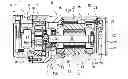 Fig. 01 - Electric compressor with the stator coils coated with resin, the resin having openings exposing the coils to the interior of the housing