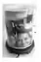 Fig. 01 - Decorative fragrance diffuser having a light source mounted to a base and a space for custom inserts