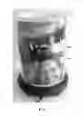 Fig. 08 - Decorative fragrance diffuser having a light source mounted to a base and a space for custom inserts