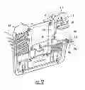 Fig. 12 - Vehicle battery storage compartment
