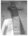 Fig. 04 - METHOD OF MAKING, TRANSPORTING AND INSTALLING SOFFIT MADE BY A MACHINE THAT CREATES CORRUGATED SHEET METAL SOFFIT WHICH SOFFIT IS COATED WITH VINYL MATERIAL WHICH VINYL MATERIAL COATS ONE OR BOTH SIDES OF THE ALUMINUM SHEET METAL PRIOR TO BEING FED THROUGH THE MACHINE THAT CREATES THE CORRUGATED SOFFIT