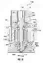 Fig. 22 - Coinjection hot runner injection molding system
