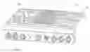 Fig. 01 - Spring clip attachment for a surface cooking module of a household cooking appliance