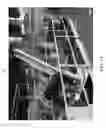 Fig. 12 - Apparatus for handing and moving a stack of tires
