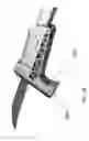 Fig. 34 - Pneumatically powered pole saw