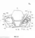 Fig. 09 - Storage structure for saddle-ride type vehicle