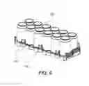 Fig. 07 - SYSTEM FOR THE TRANSPORT OF AN ARRAY OF A PLURALITY OF SELF-SUPPORTING CONTAINERS FOR LIQUIDS
