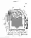 Fig. 12 - Device for holding workpiece and machine tool
