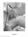 Fig. 19 - Apparatus and method for clamping and trimming the bone tendon portion of a graft to a desired size