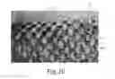Fig. 14 - Nonwoven material having discrete three-dimensional deformations with differential opacity regions