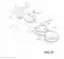 Fig. 15 - Vehicle beverage holder