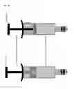 Fig. 11 - Vacuum expanded dry composition and syringe for retaining same