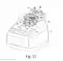 Fig. 13 - Food processing device with an externally operated adjustment mechanism