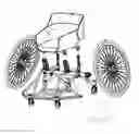 Fig. 03 - Wheelchair with multiple replaceable seats