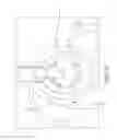 Fig. 22 - Combination lip retractor and guard with integrated light source, suction, and surgical smoke plume filter