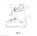 Fig. 03 - Ski boot and strap combination providing enhanced lateral performance