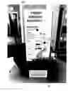 Fig. 01 - Windshield washer fluid vending system with portable excess fluid containers