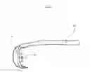 Fig. 14 - Gun grip with finger placement and holstering features