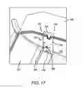 Fig. 16 - Overhead storage bin latch system