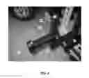 Fig. 06 - Mounting System Employing an X-Shaped Adapter for Mounting Devices to a Square Receiver