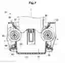Fig. 08 - Container holder including a swing member rotatably supporting a roller to hold a container received therein